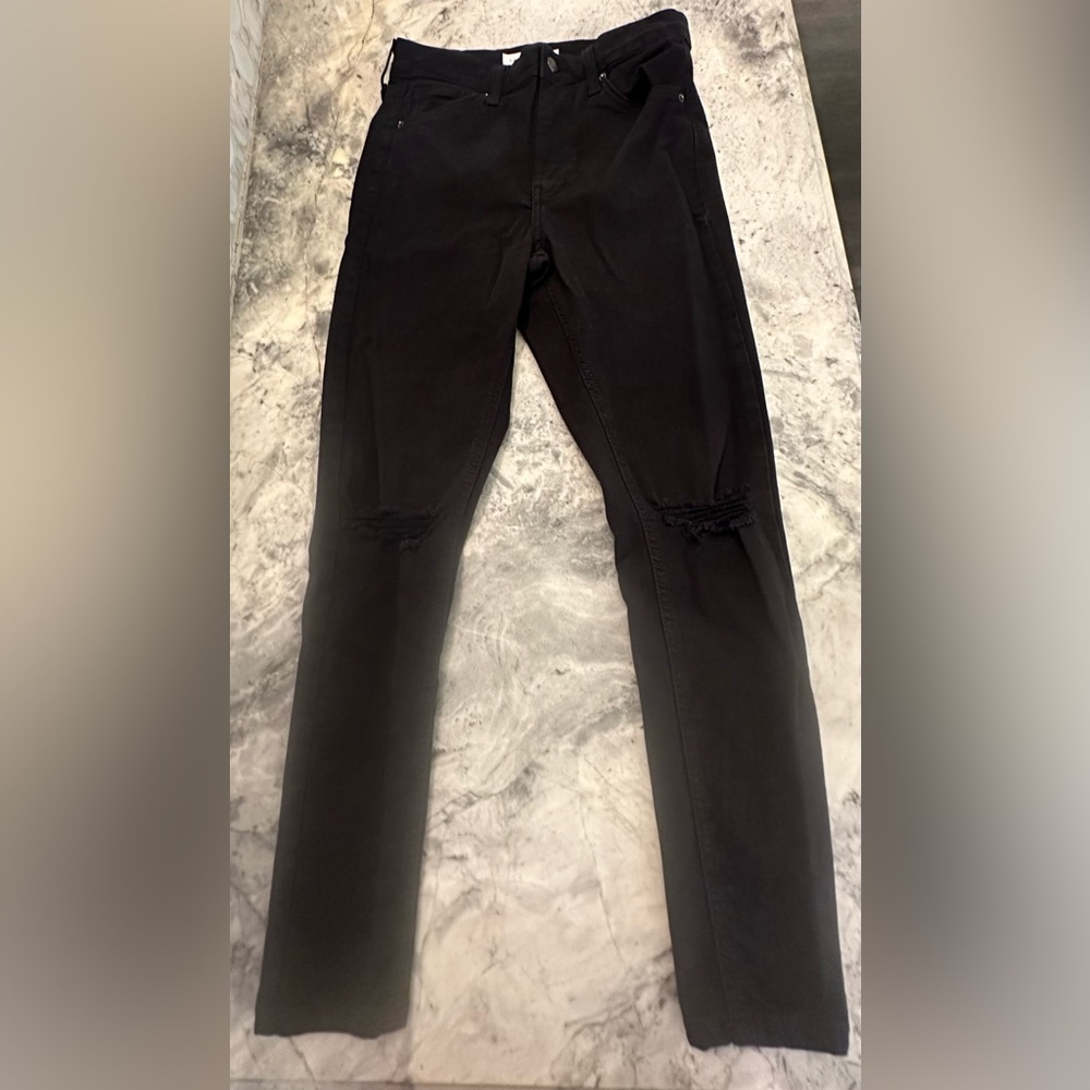 Topshop women’s black, distressed jeans